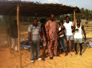 My two Nigerian friends at the beach with friends and family